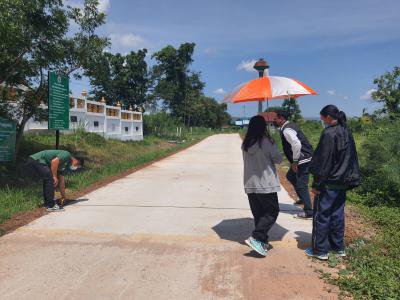 คณะกรรมการตรวจงานโครงการก่อสร้างถนน คสล.(สายหน้าวัด-หมู่ที่ 2) หมู่ 10